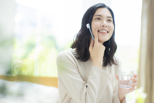 女性　歯　チェック